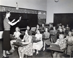 Lindenwood Student Teaching Music to Elementary School Students, circa 1950s by Unknown