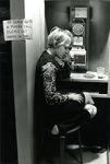 Lindenwood College Student Using a Payphone in McCluer Hall, 1967