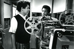 Lindenwood College Students, Michael Roberts and Noren Kirksey, Running a Projector, 1971 by Lindenwood College