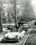 President McCluer and Hubert Humphrey leading Car Procession by Lindenwood College